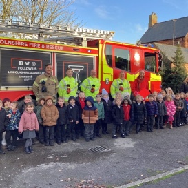 Leverton Fire and Rescue Team visiting the Reception children with their fire engine